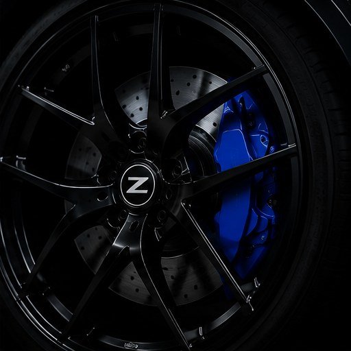 Alloy wheel with blue painted brake caliper